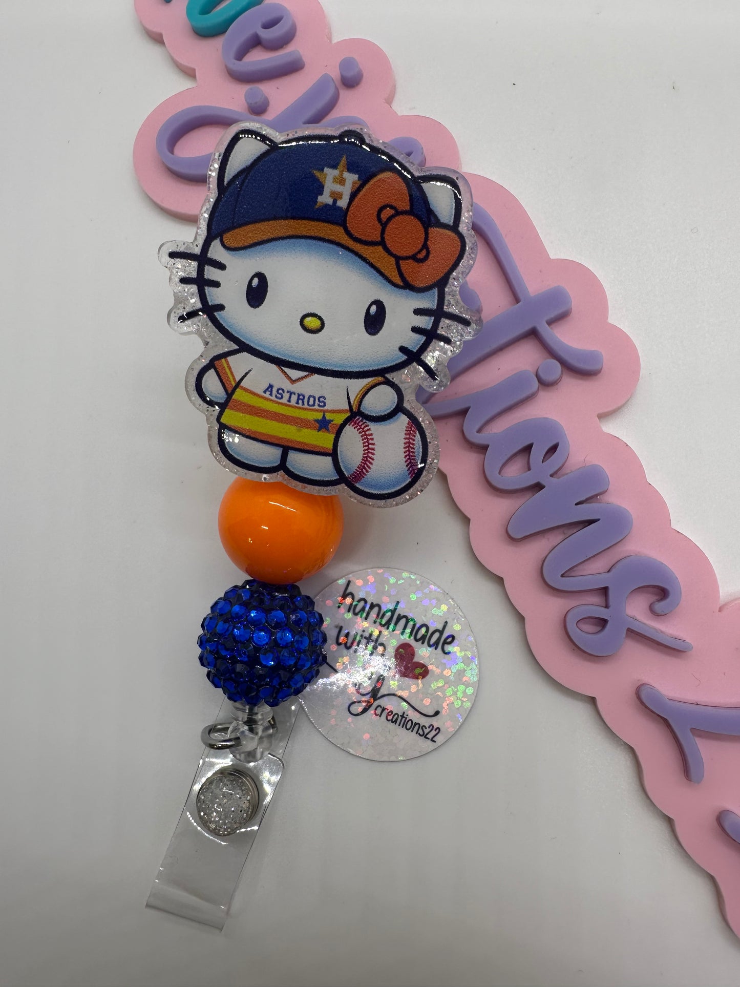 Kitty Orange and White sports Badge Reel