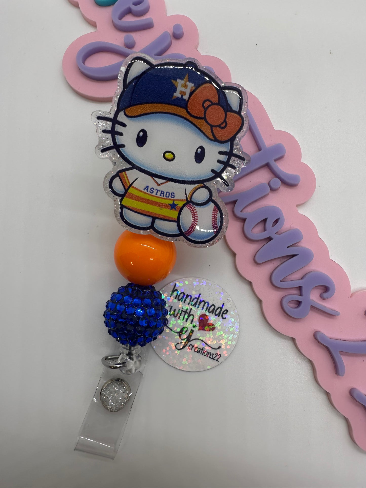 Kitty Orange and White sports Badge Reel