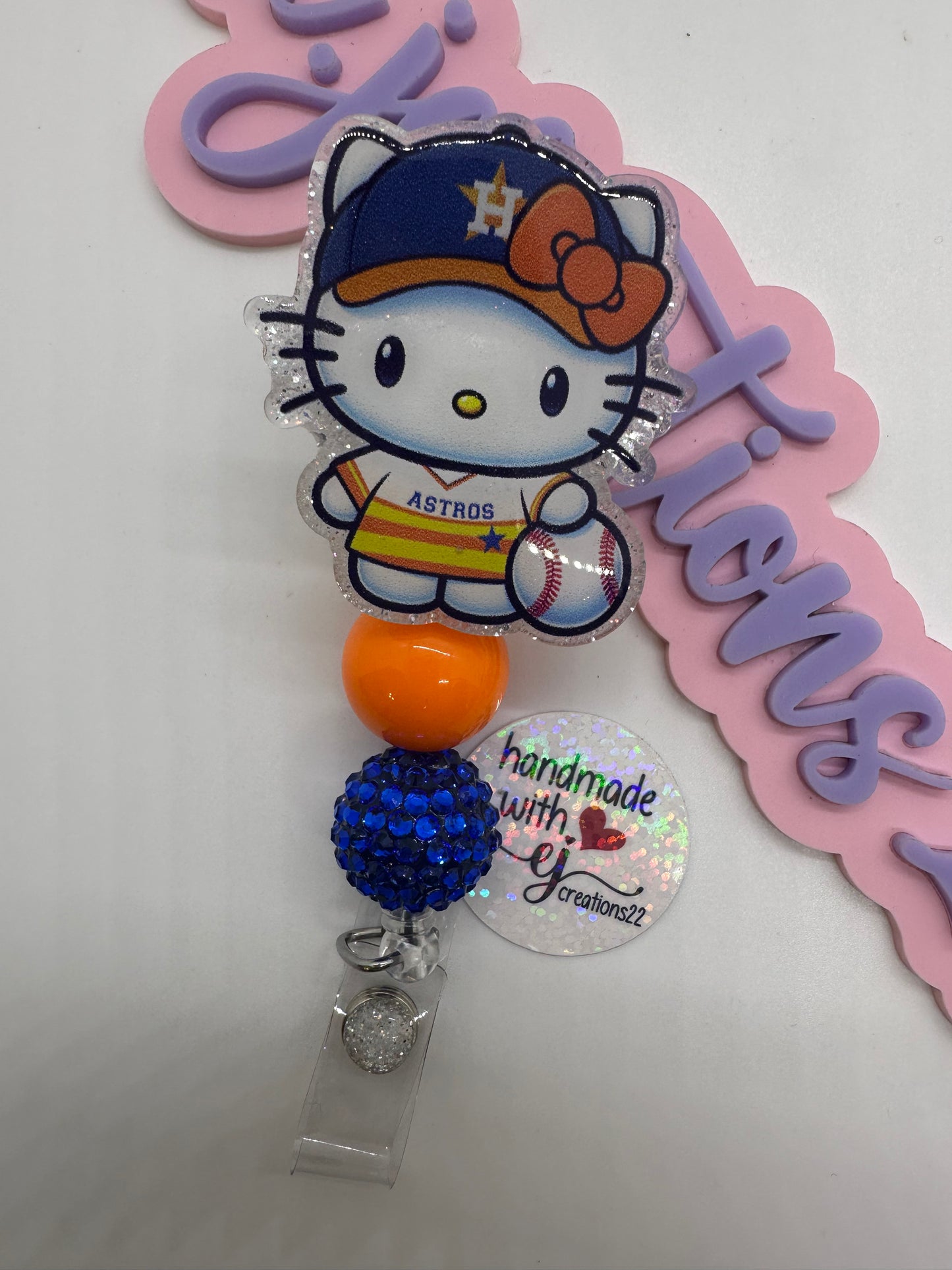 Kitty Orange and White sports Badge Reel