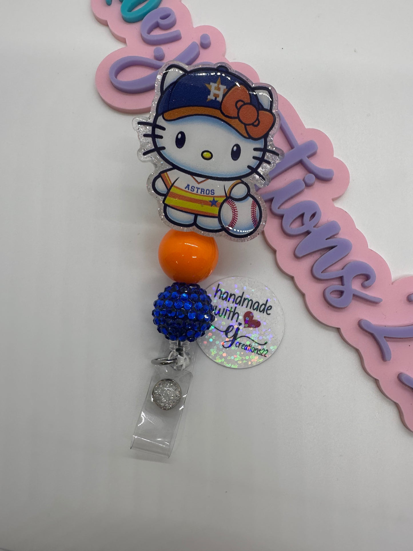 Kitty Orange and White sports Badge Reel