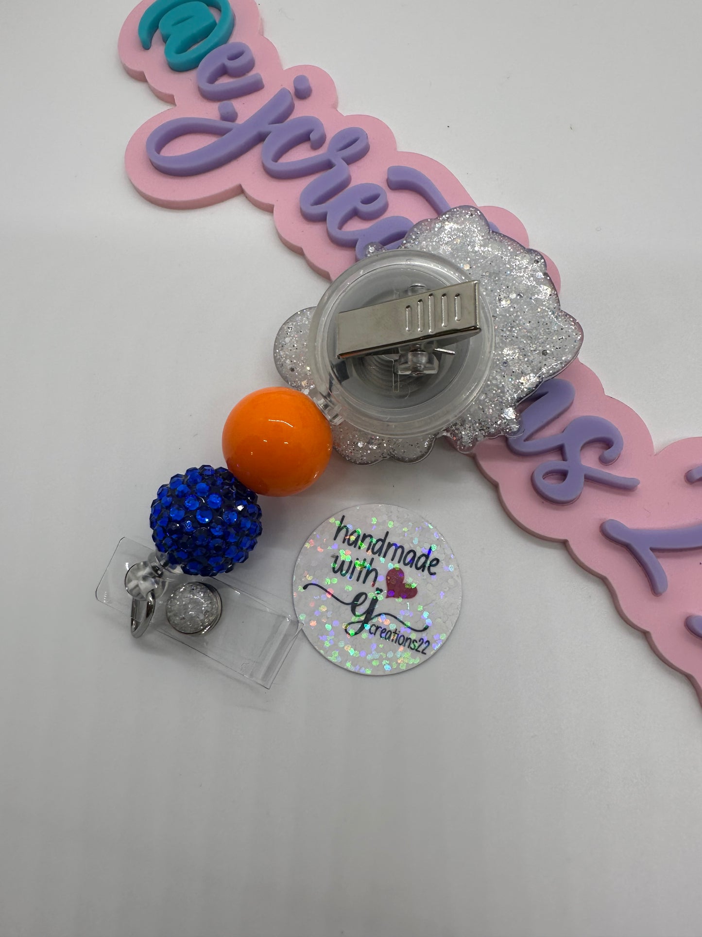 Kitty Orange and White sports Badge Reel