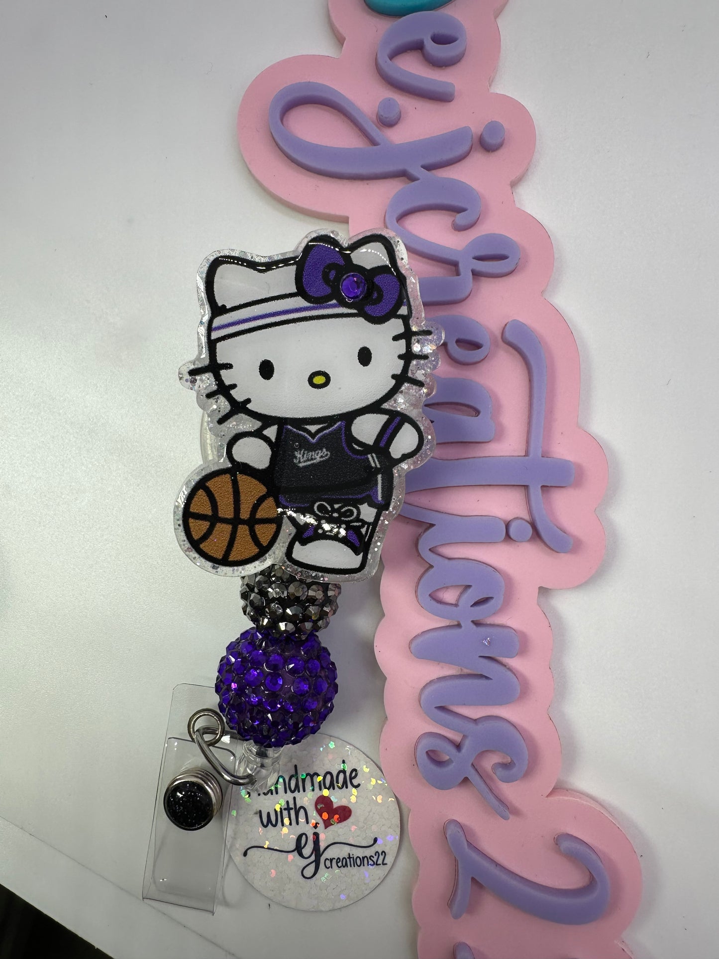 Kitty King Badge Reel