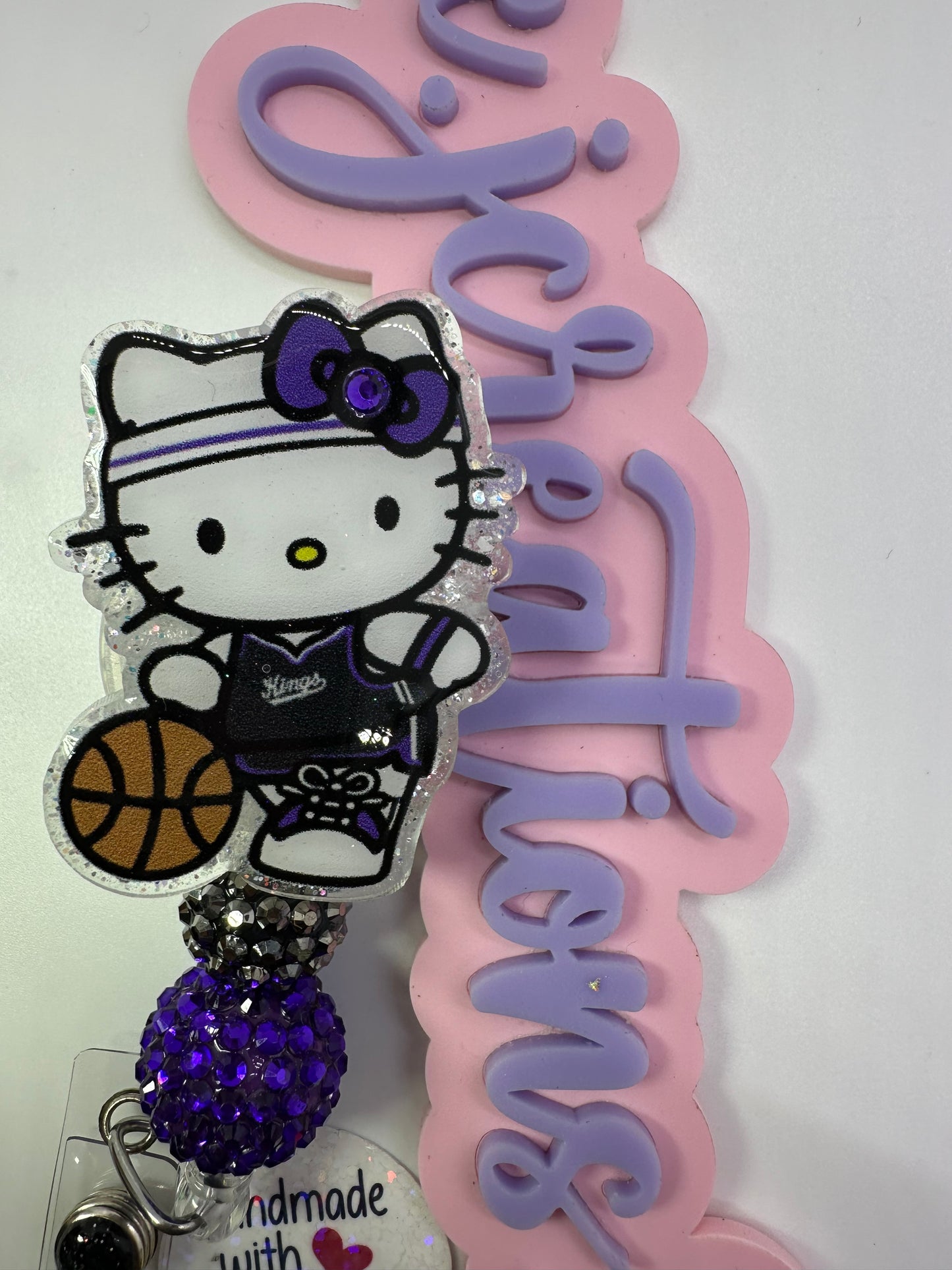 Kitty King Badge Reel