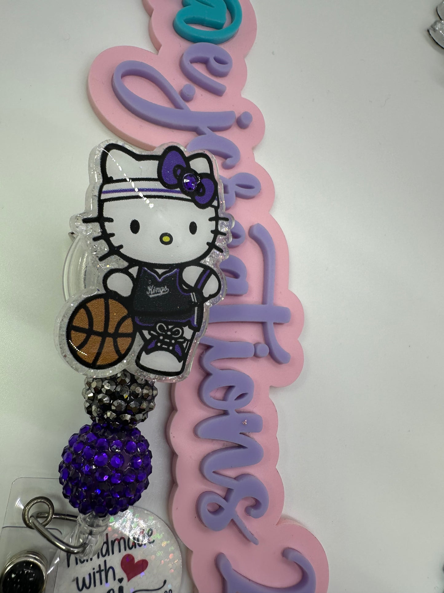 Kitty King Badge Reel