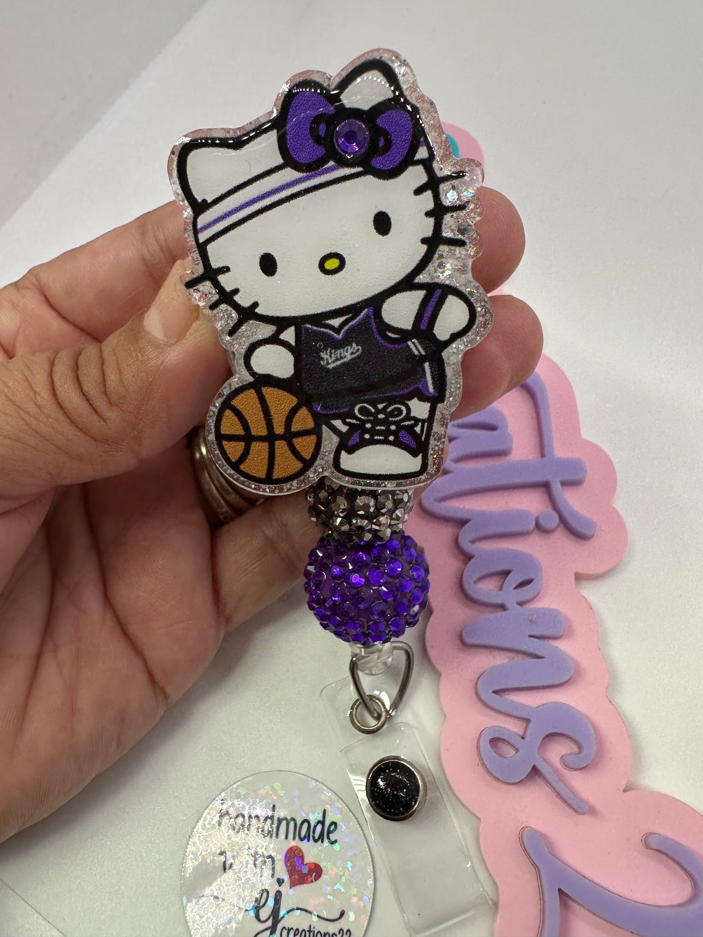 Kitty King Badge Reel