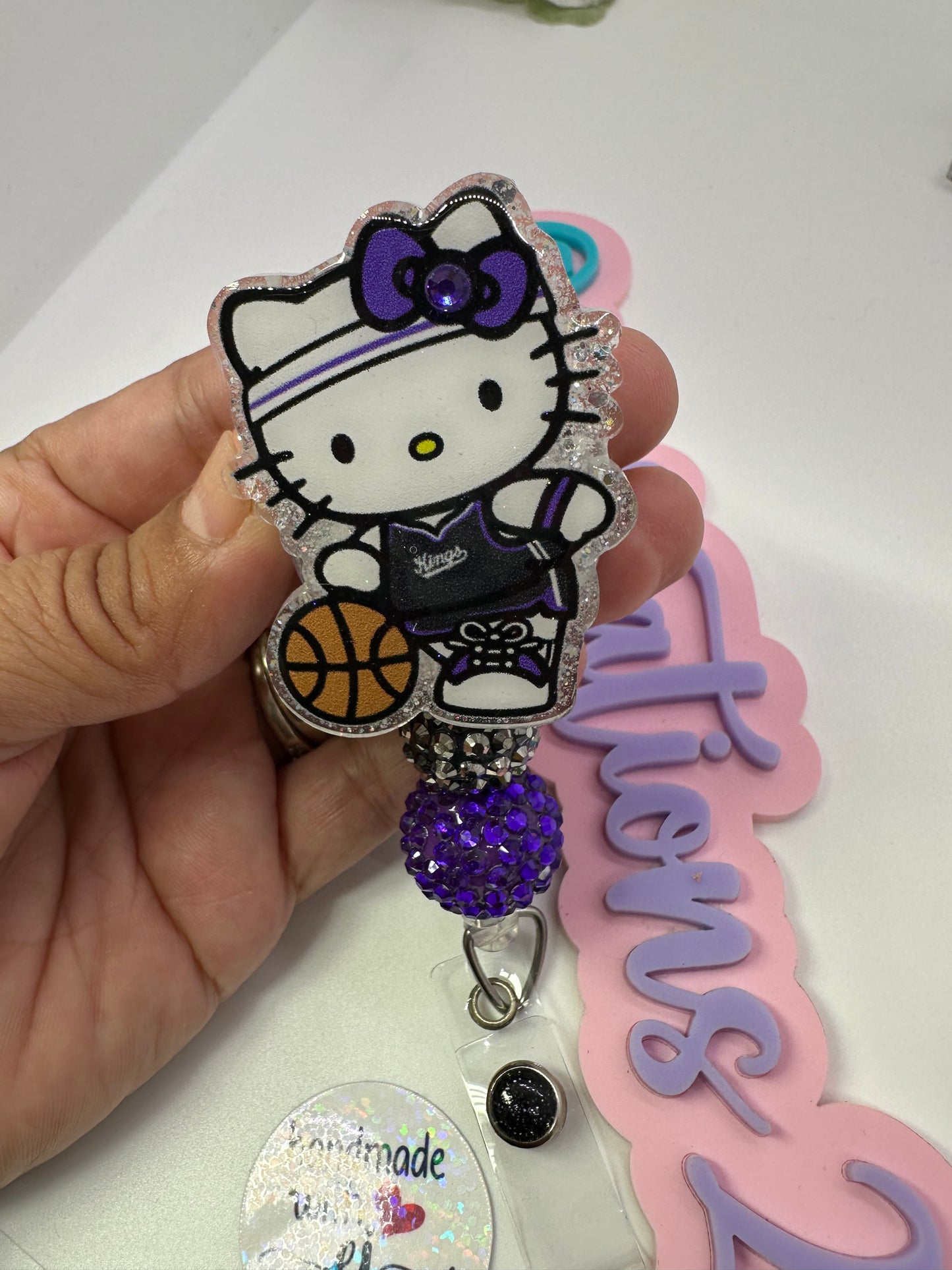 Kitty King Badge Reel