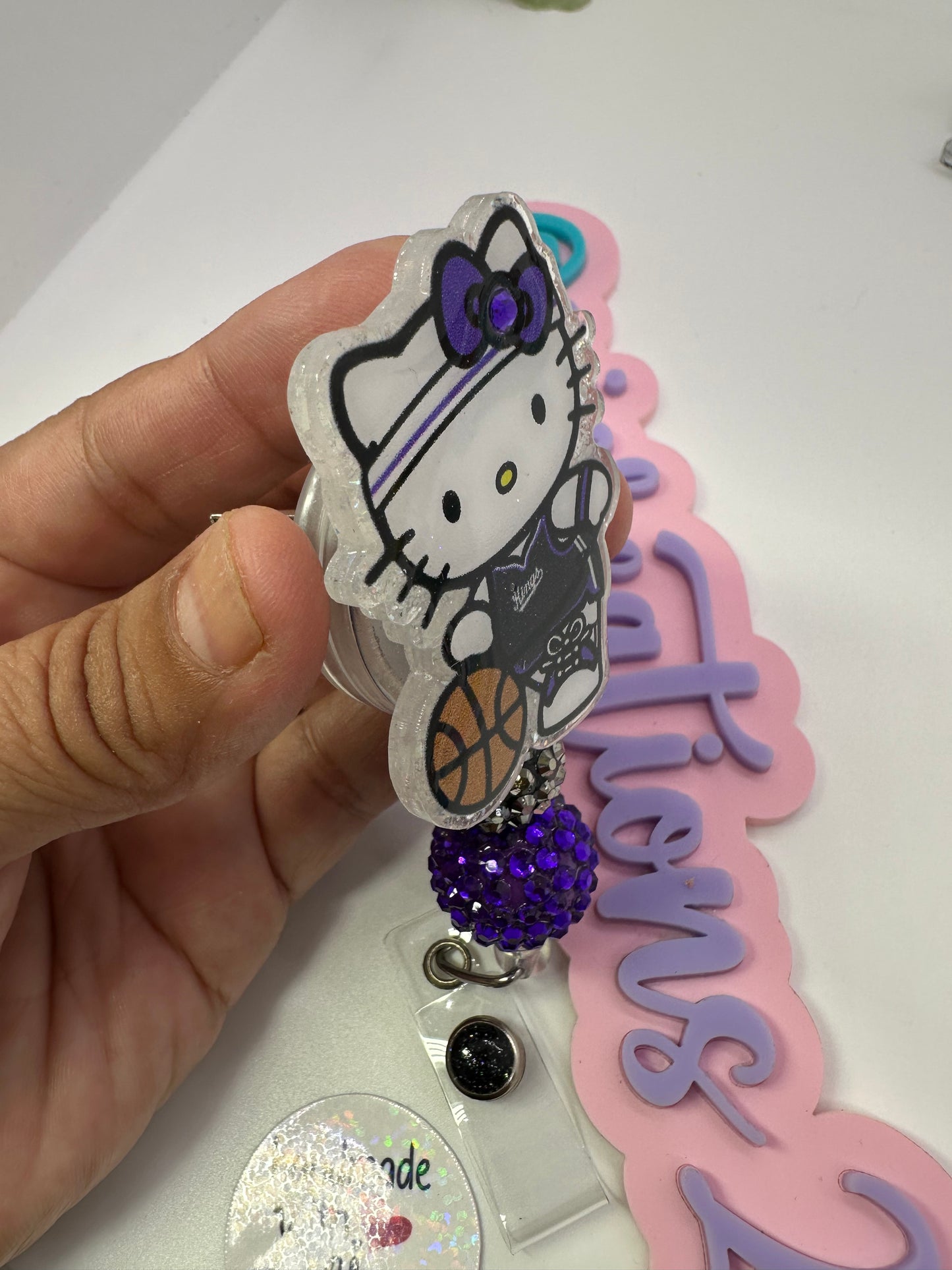 Kitty King Badge Reel