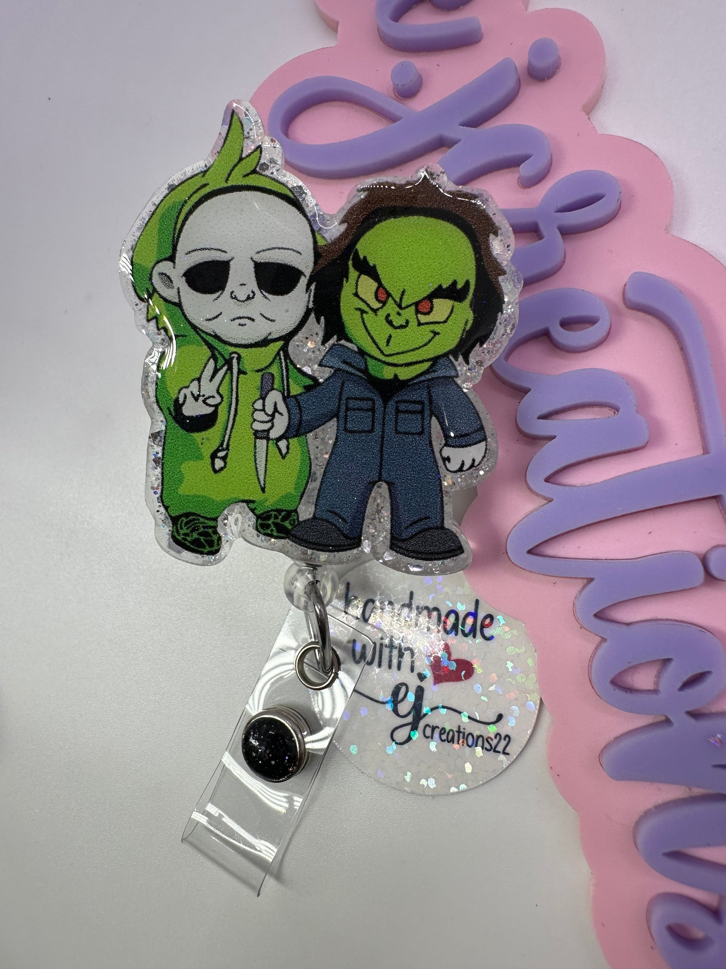 Greench and Myers Badge Reel