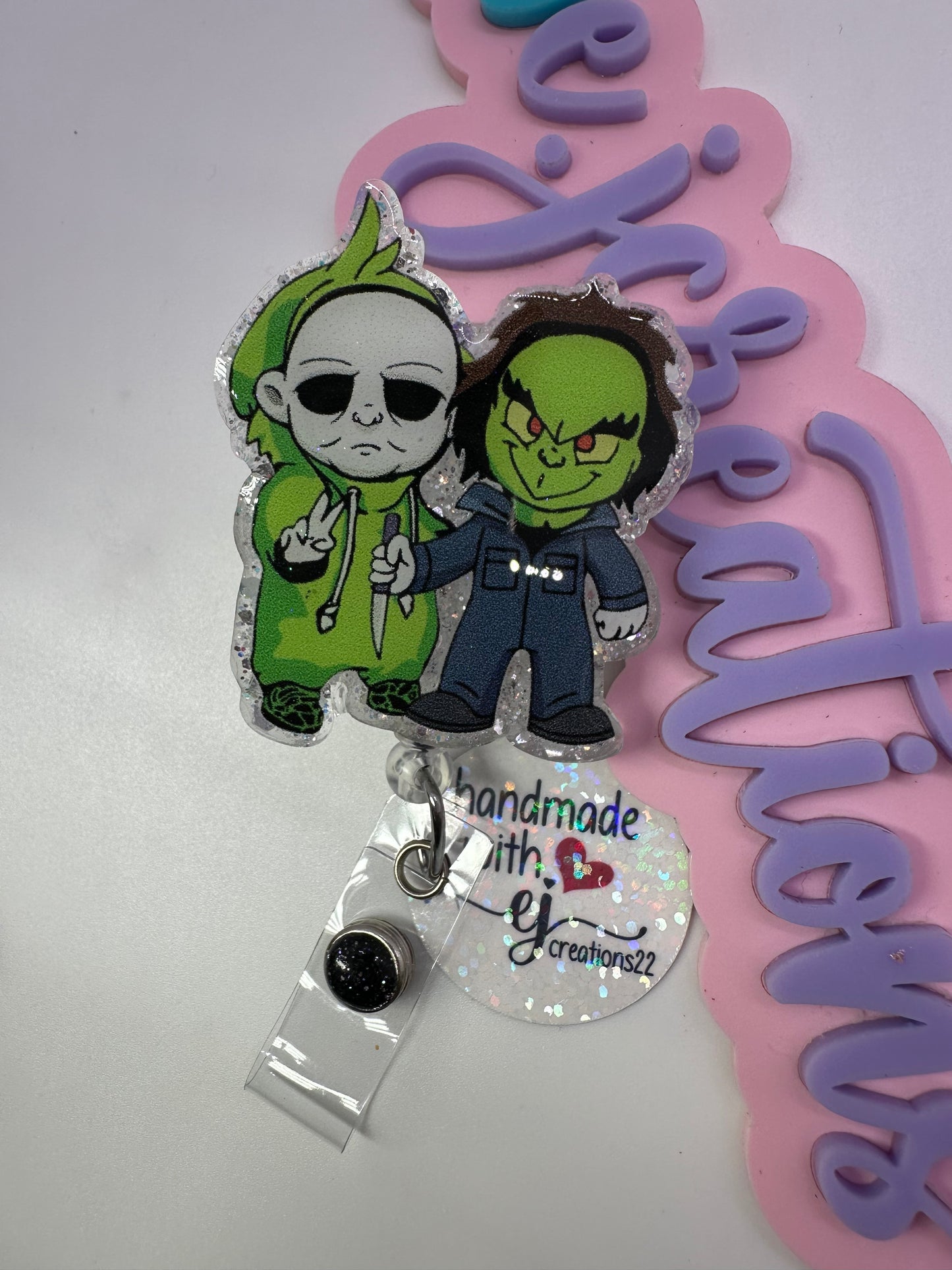 Greench and Myers Badge Reel