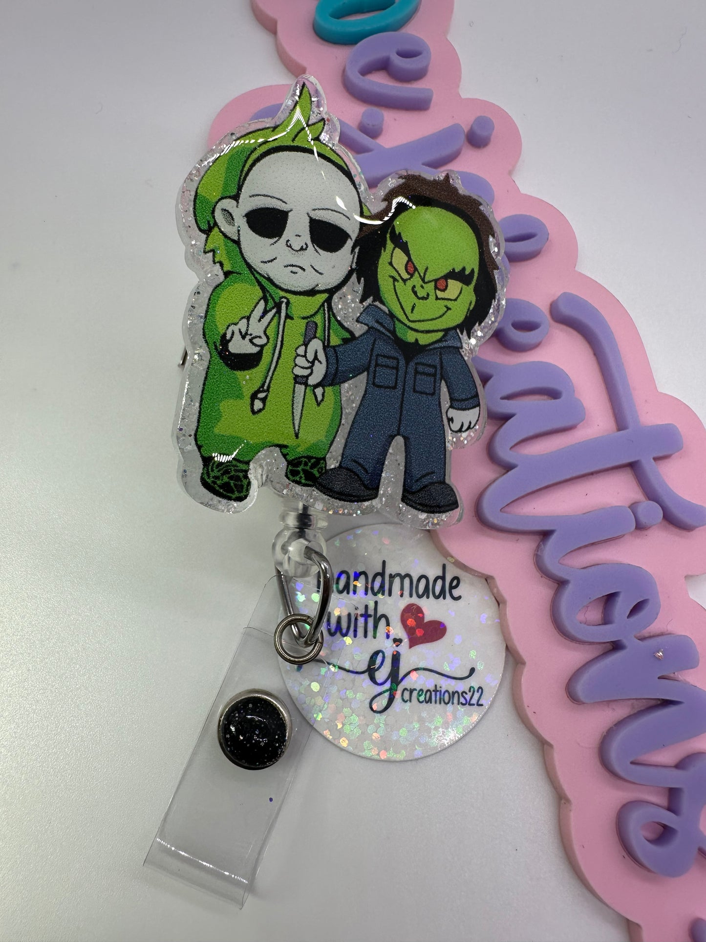 Greench and Myers Badge Reel