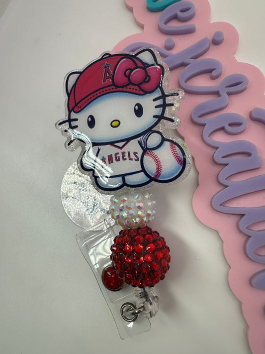 Kitty Red and White Badge Reel