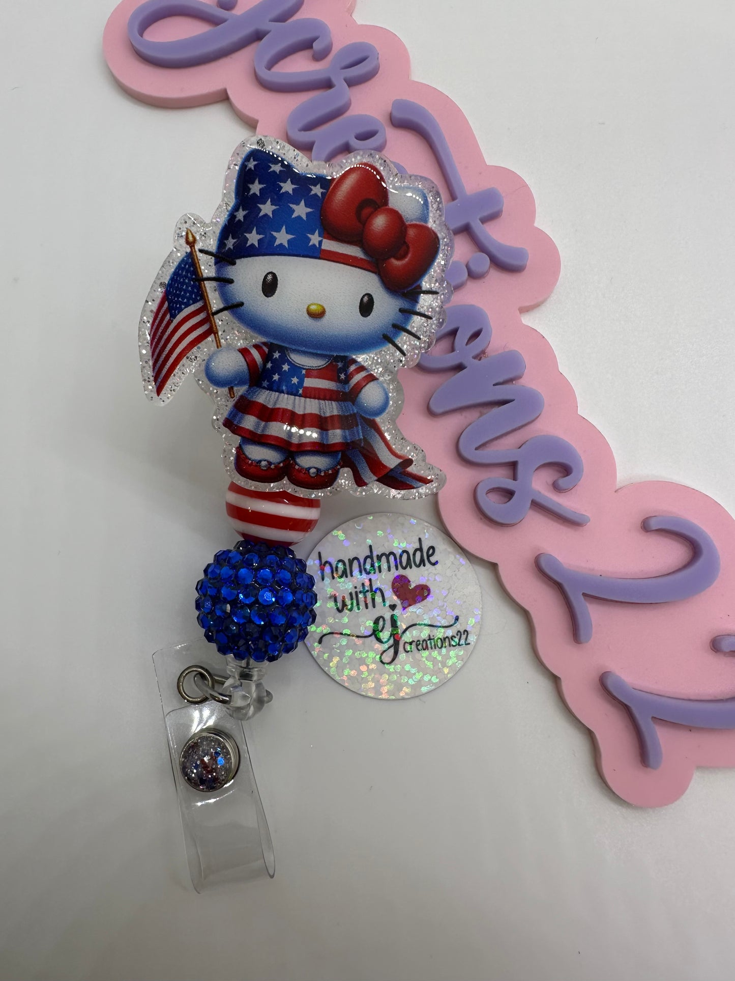 Kitty Red White and Blue Badge Reel