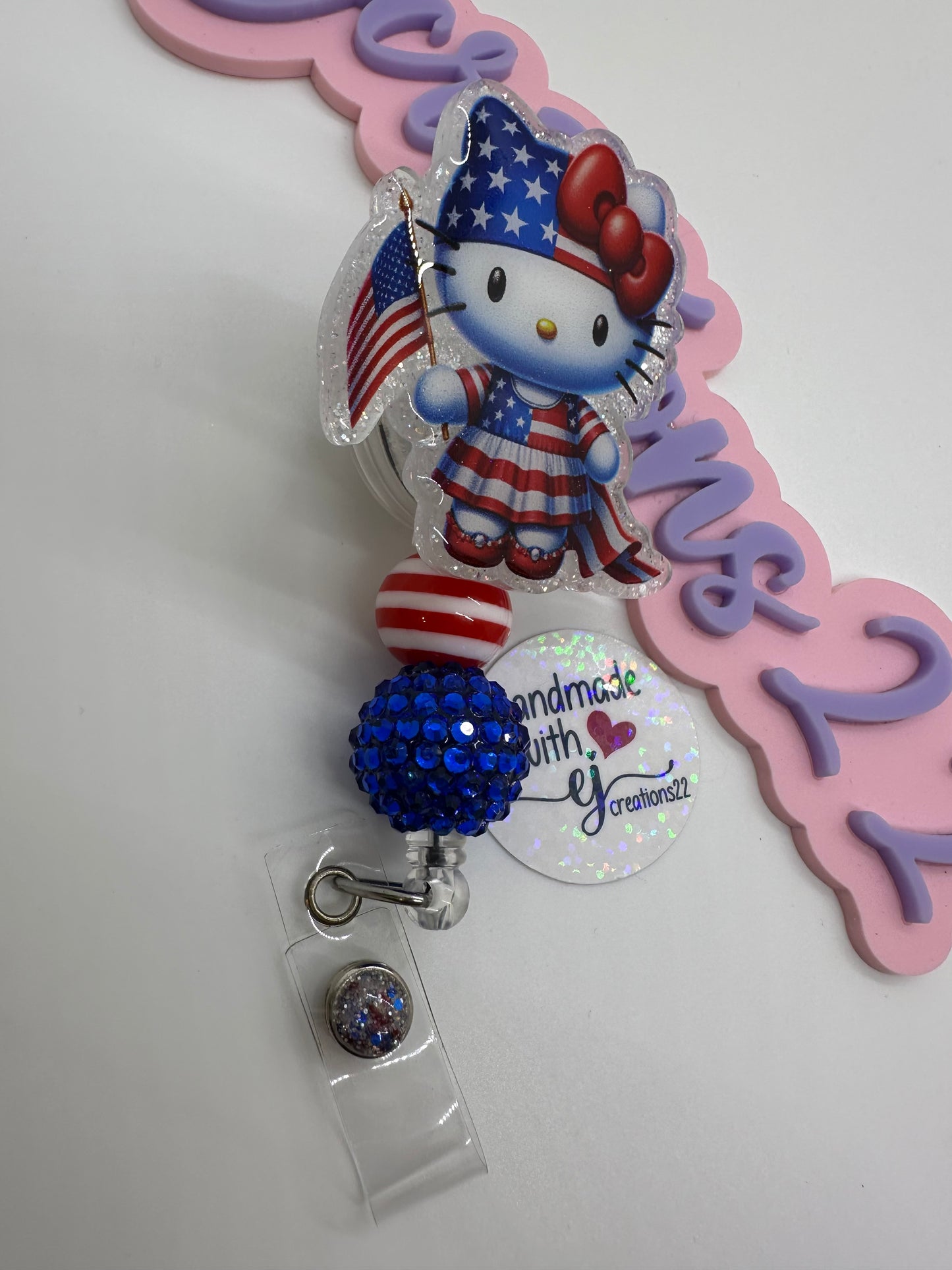 Kitty Red White and Blue Badge Reel