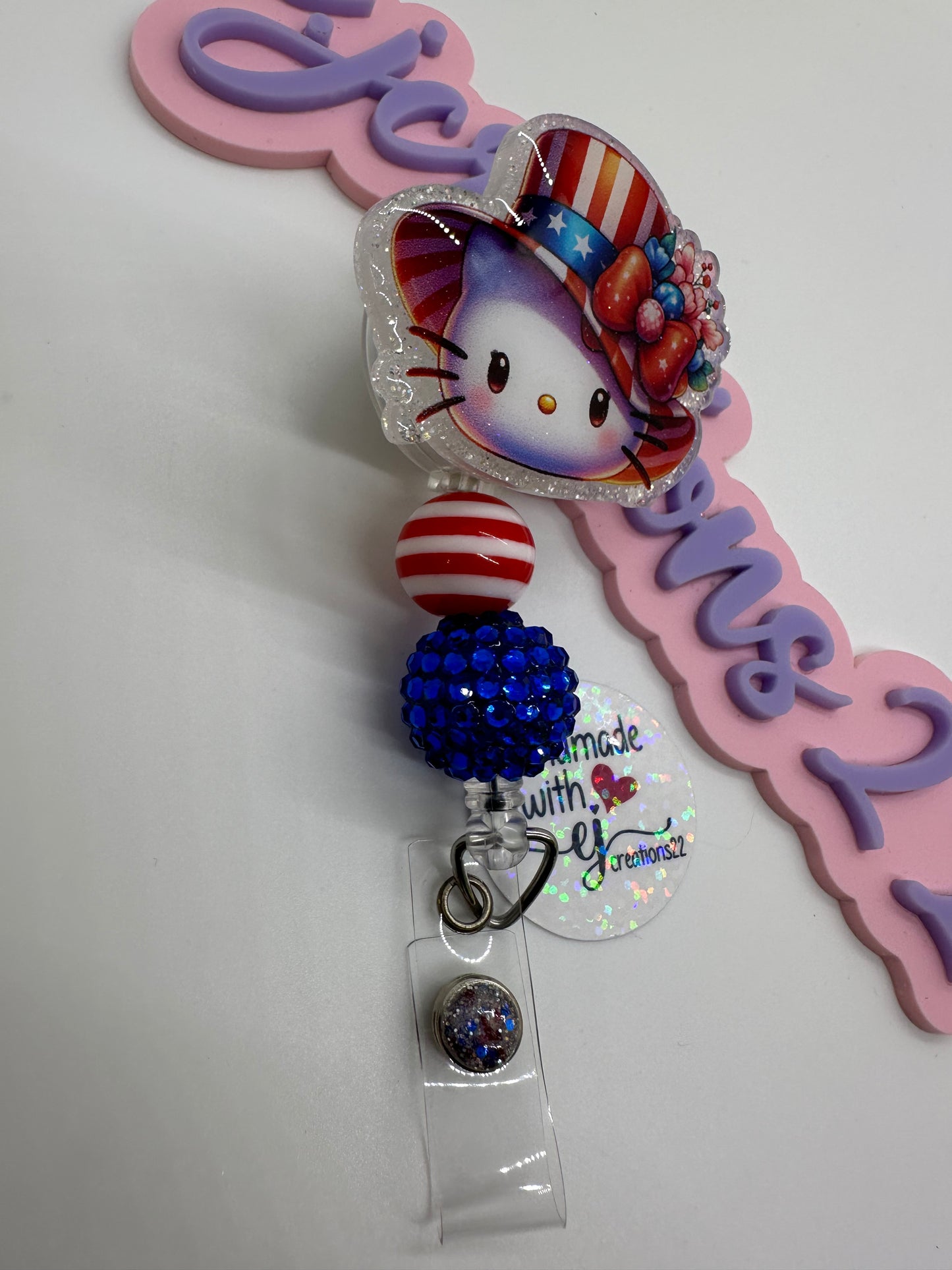 Kitty Red White and Blue Badge Reel