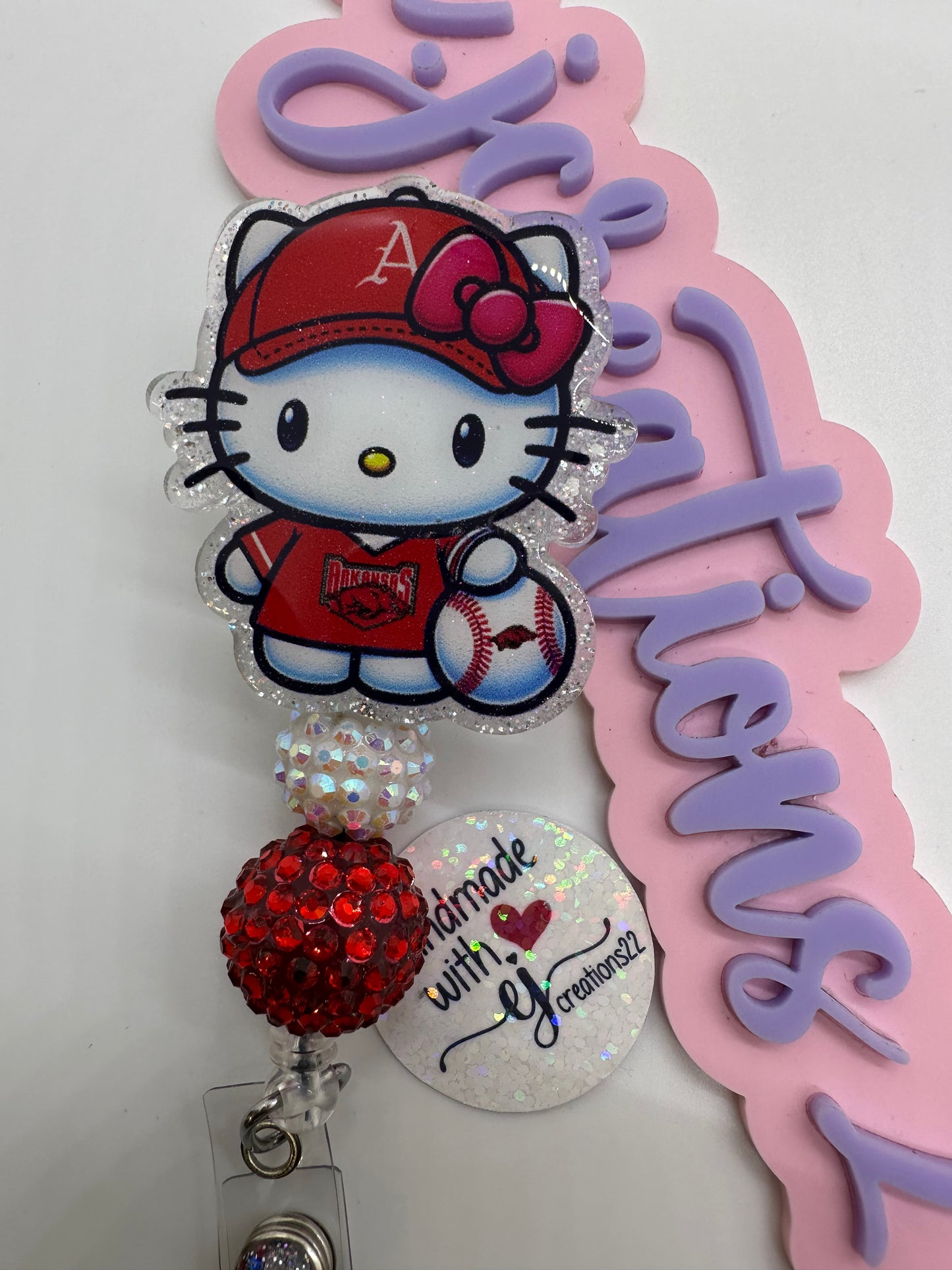 Kitty Razor Badge Reel