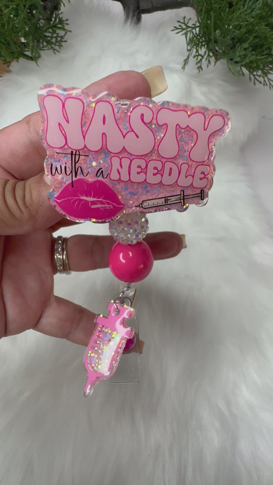 NASTY With a Needle Badge Reel