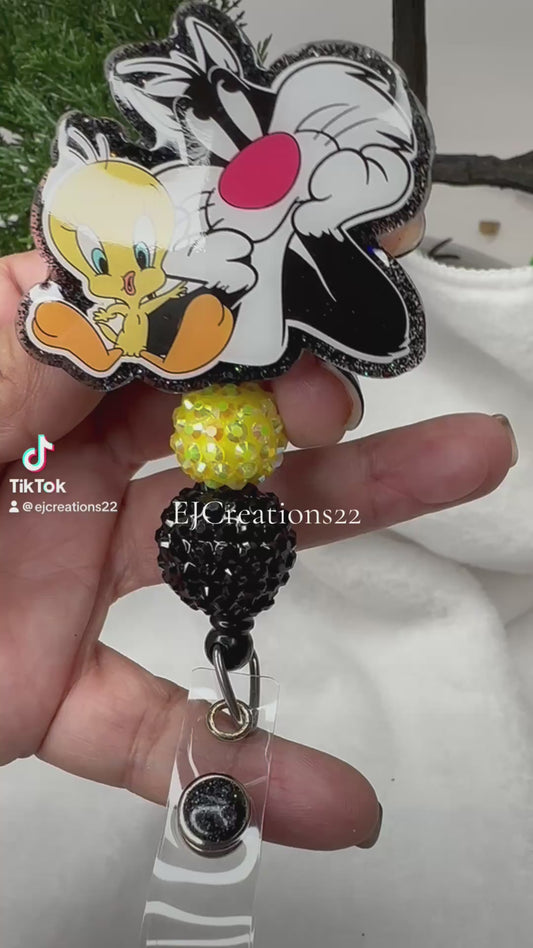 Yellow Bird Black Cat Badge Reel