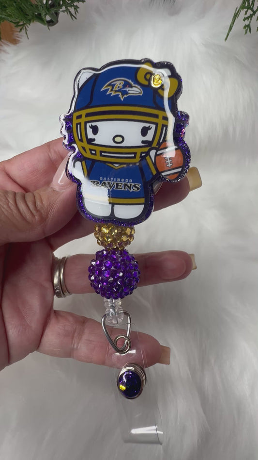 Kitty Football Purple/Gold Badge Reel